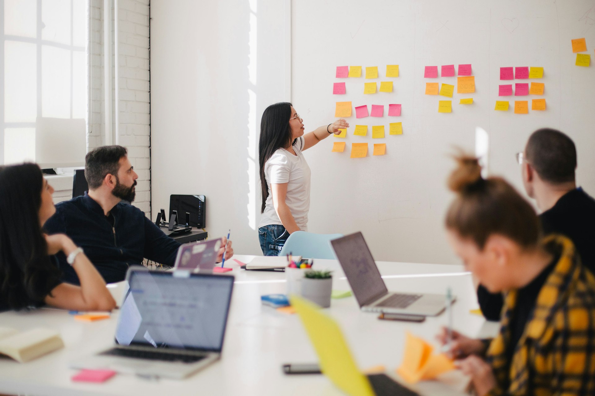 The Hub Outdoor team collaborating in a modern office